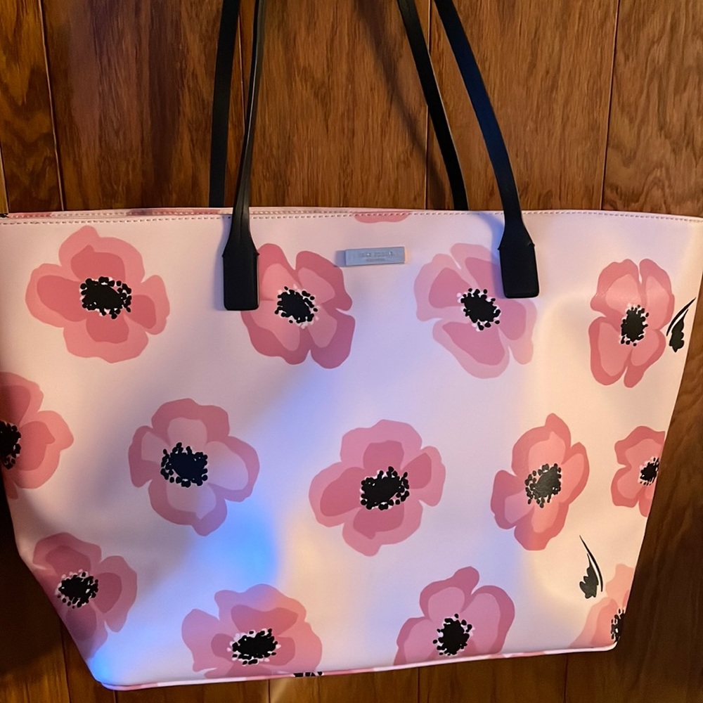 Kate Spade-like new.